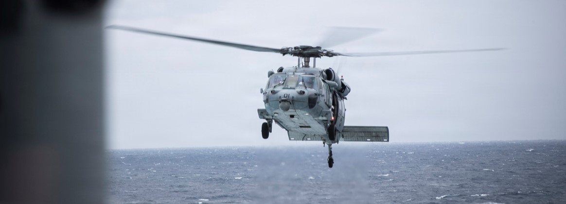 A U.S. Navy MH-60R Sea Hawk, assigned to Helicopter Combat Squadron (HSC) 25, conducts flight operations aboard the America-class amphibious assault ship USS Tripoli (LHA 7), Jan. 21, 2026. Tripoli is conducting routine operations in the U.S. 7th Fleet area of operations. U.S. 7th Fleet is the U.S. Navy’s largest forward-deployed numbered fleet and routinely interacts and operates with allies and partners in preserving a free and open Indo-Pacific region. (U.S. Navy photo by Chief Mass Communication Specialist Leonard Adams)