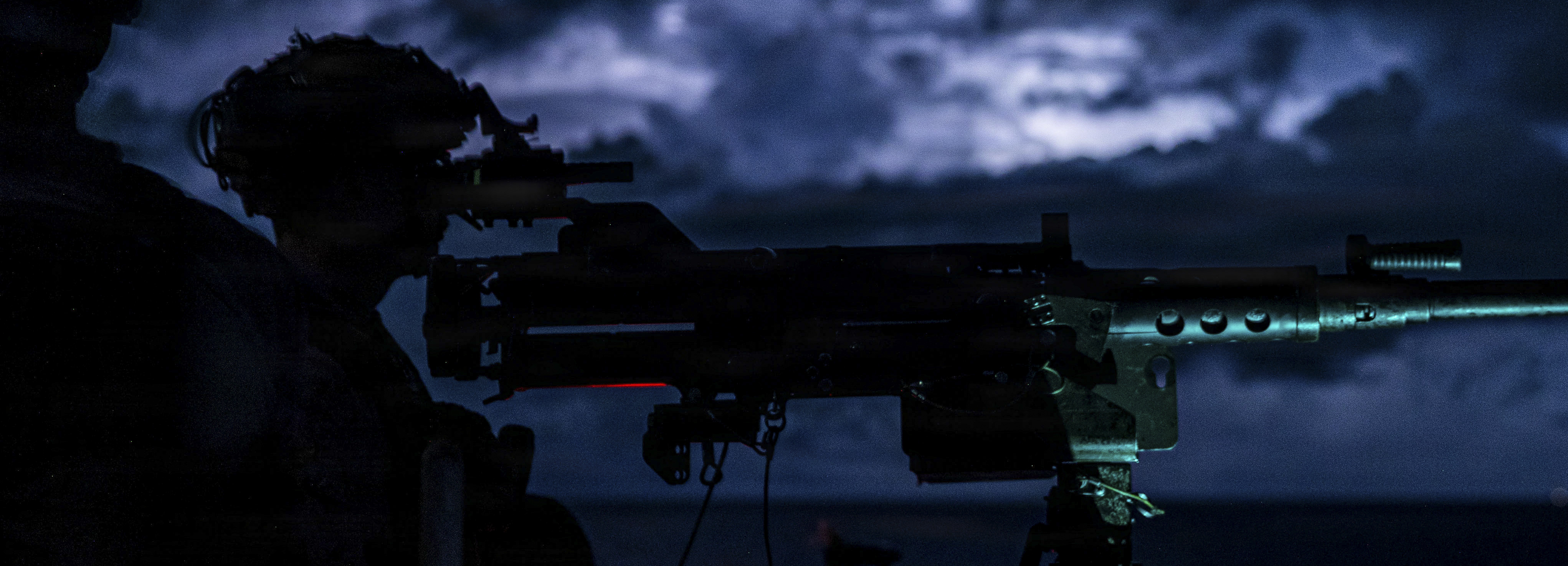 U.S. Marine Corps Sgt. Bryan Avalos, a section chief with Echo Battery, Battalion Landing Team 3/5, 11th Marine Expeditionary Unit, stands post aboard San Antonio-class amphibious transport dock ship USS Portland (LPD 27) while transiting the Surigao Strait, May 2, 2026. The 11th MEU, embarked aboard the Boxer Amphibious Ready Group, is a persistent, combat credible force contributing to deterrence and crisis response in the U.S. 7th Fleet area of operations. U.S. 7th Fleet, the U.S. Navy's largest forward-deployed numbered fleet, routinely interacts and operates with allies and partners to preserve a free and open Indo-Pacific. (U.S. Marine Corps photo by Cpl. Avery Wayland)